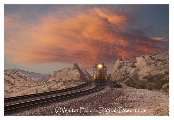 Train rolling through Mojave Desert
